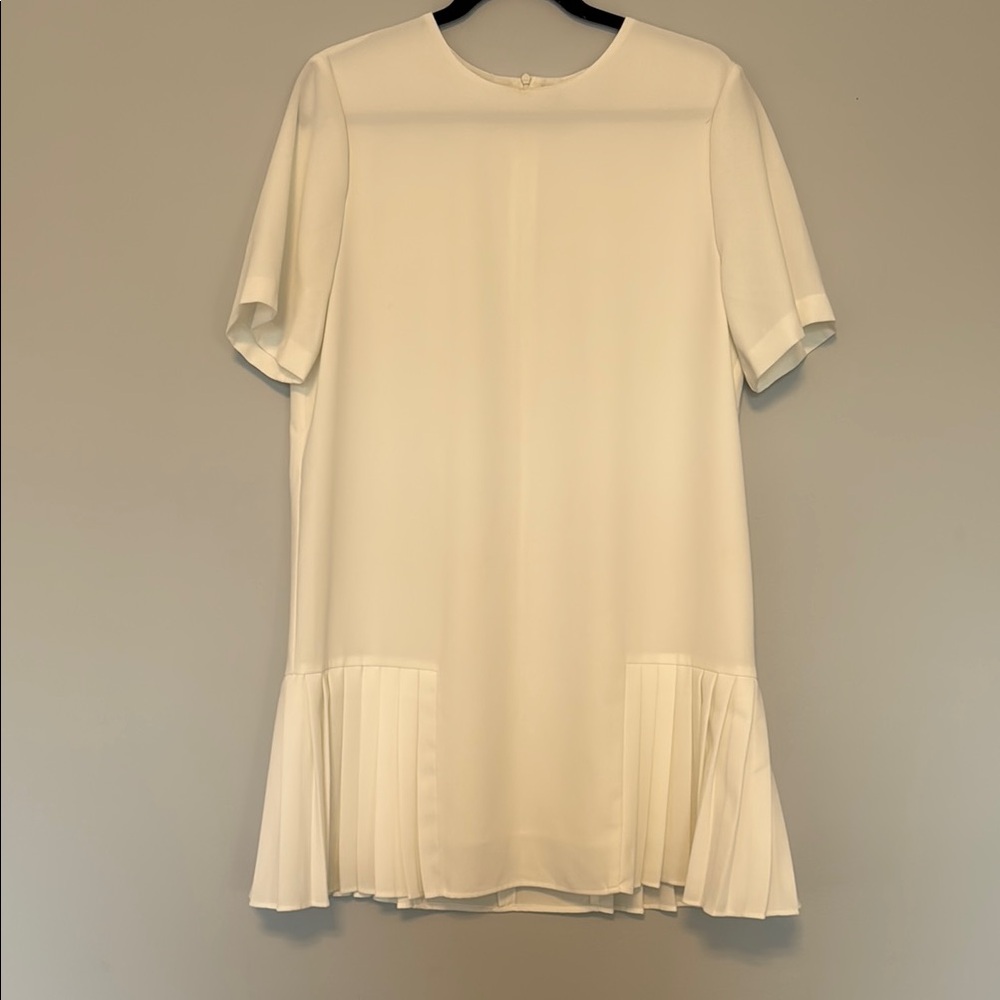 Zara Stylish White Dress with Pleated Hem